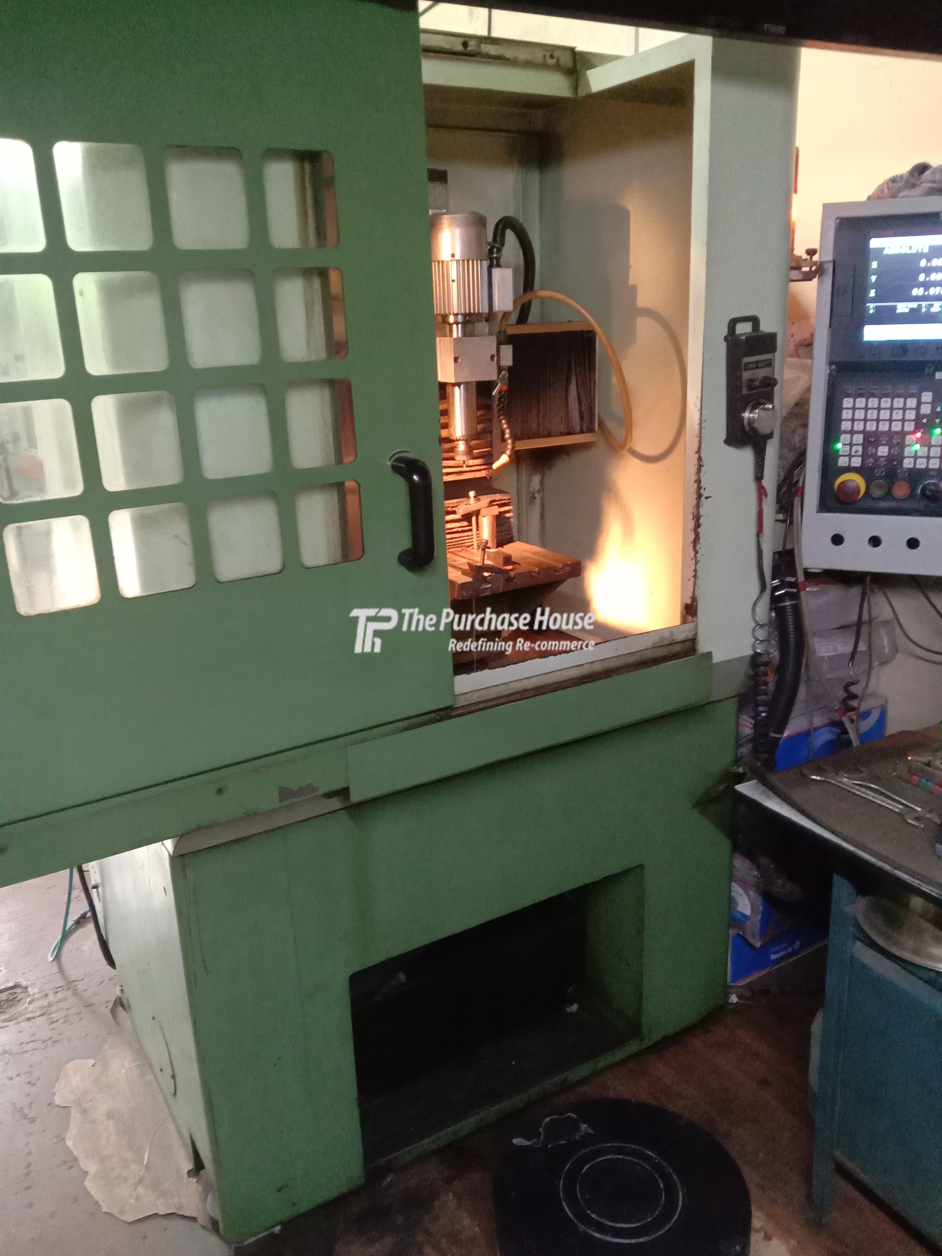 CNC ENGRAVING MACHINE
