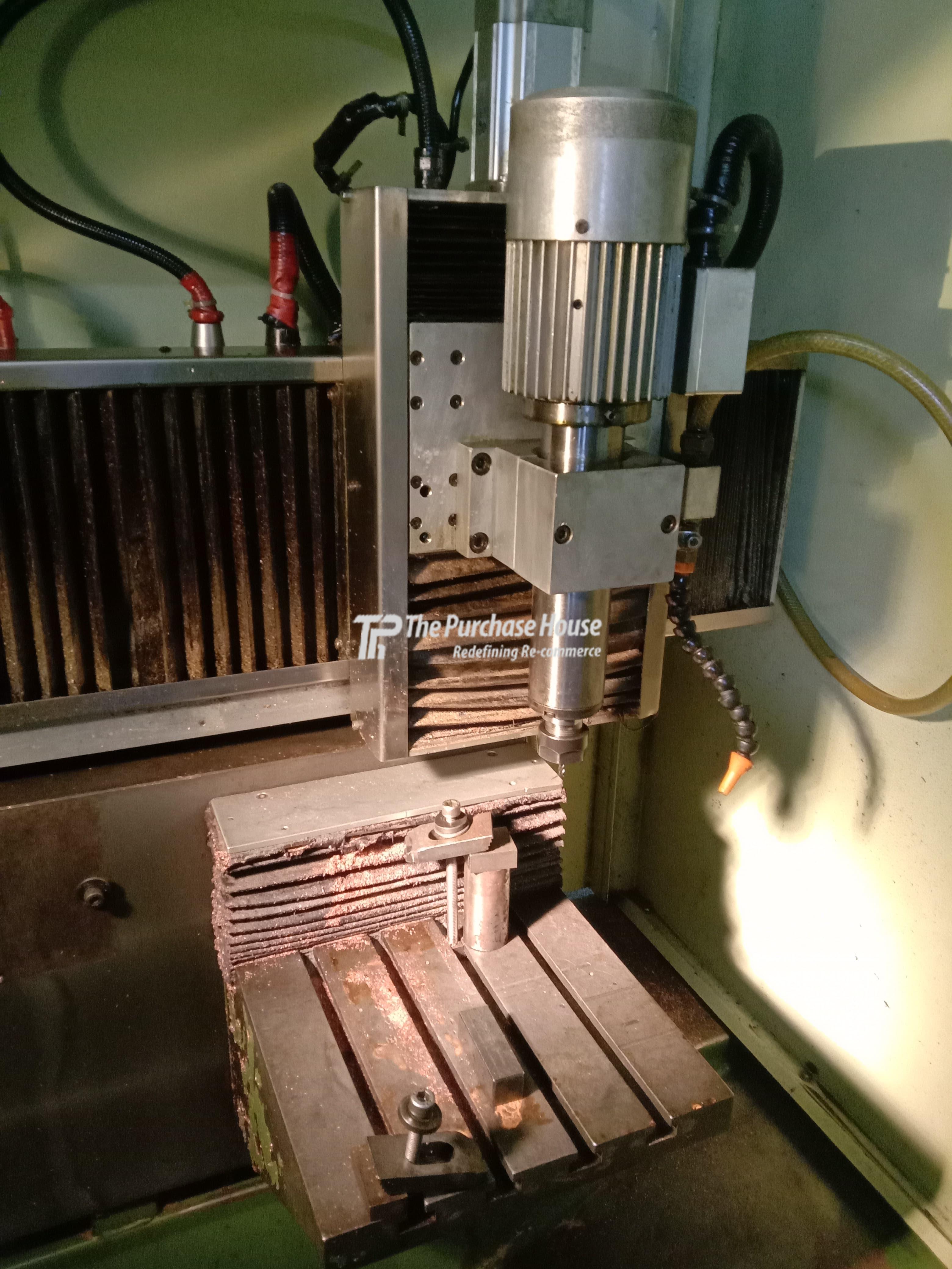 CNC ENGRAVING MACHINE