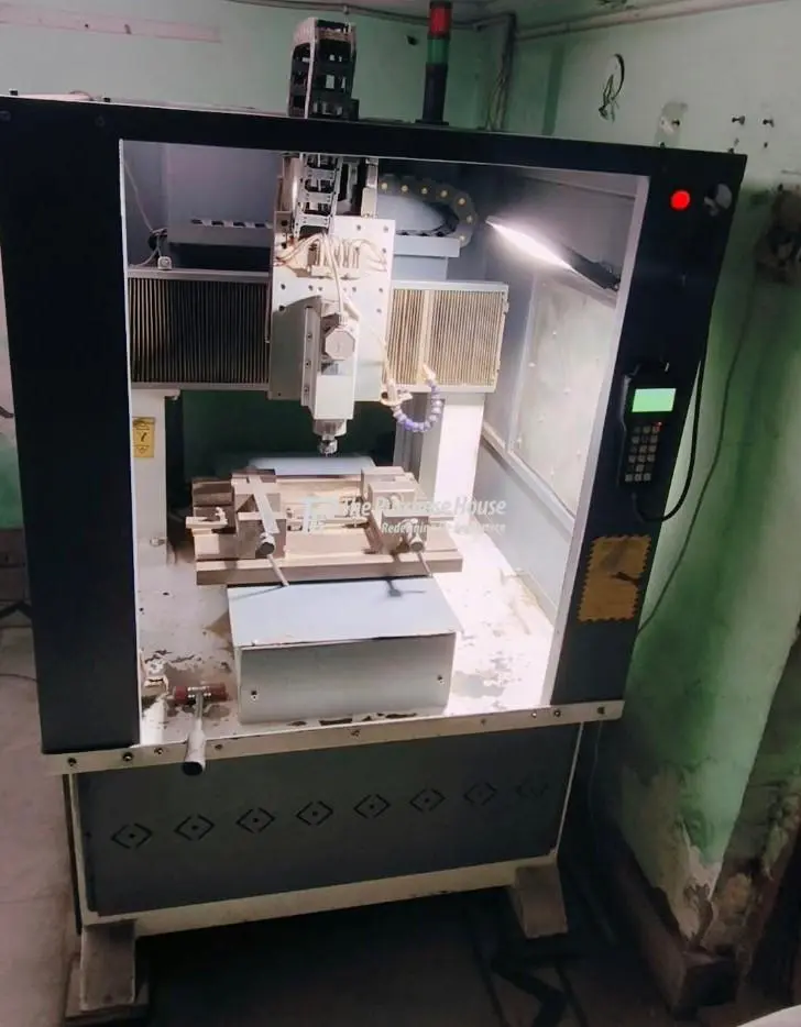 CNC ENGRAVING MACHINE