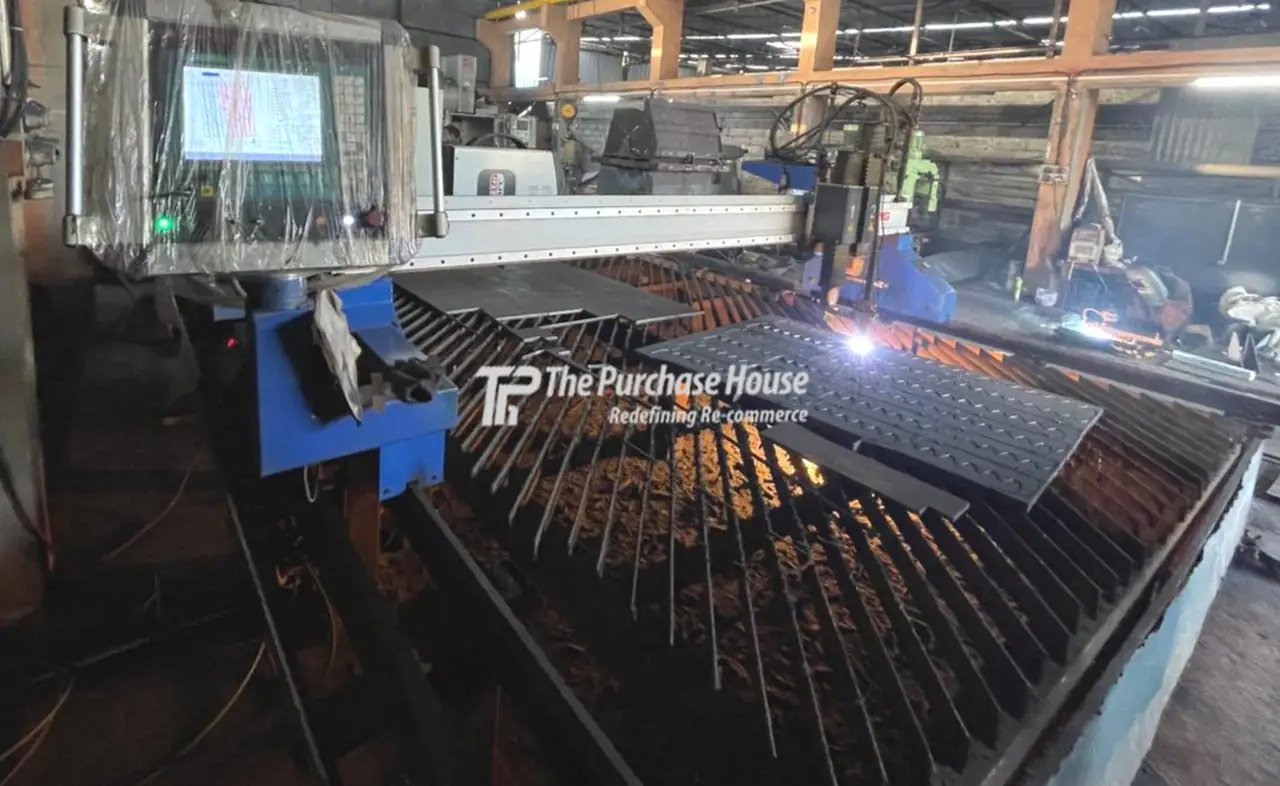 CNC LASER CUTTING MACHINE