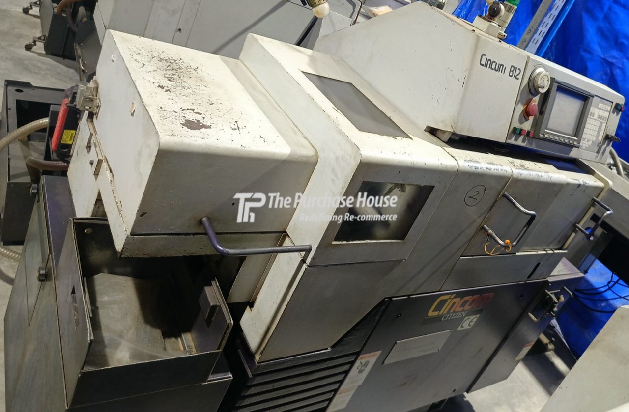 CNC SLIDING HEADSTOCK MACHINE