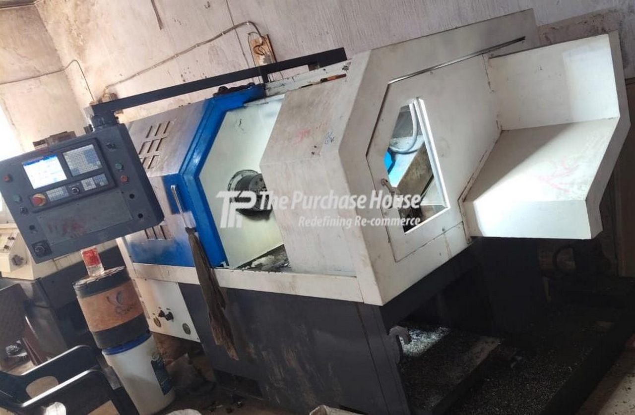 CNC TURNING MACHINE