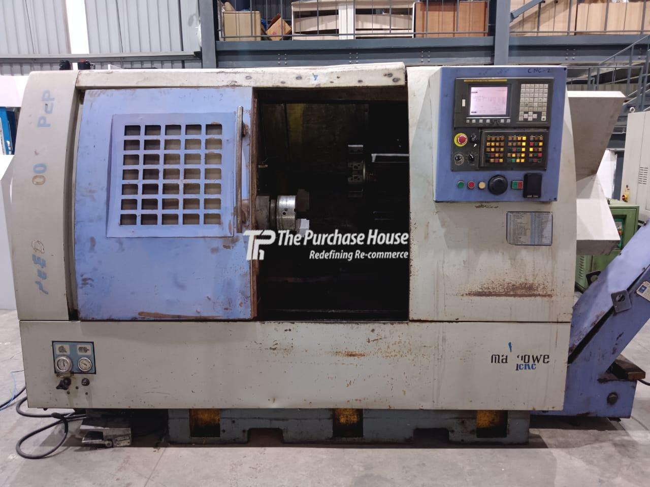 CNC TURNING MACHINE
