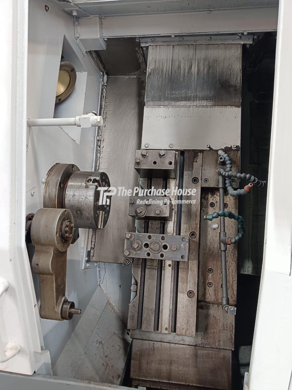 CNC TURNING MACHINE