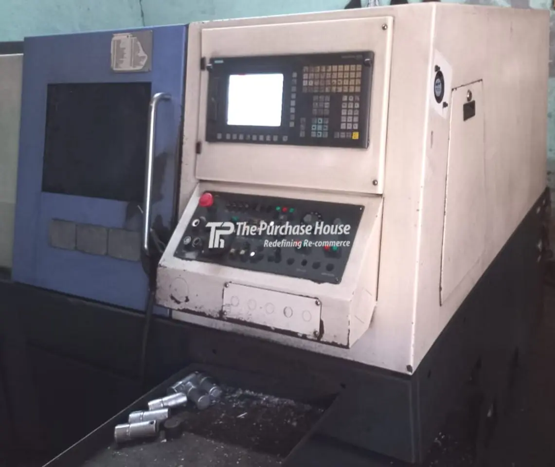 CNC TURNING MACHINE
