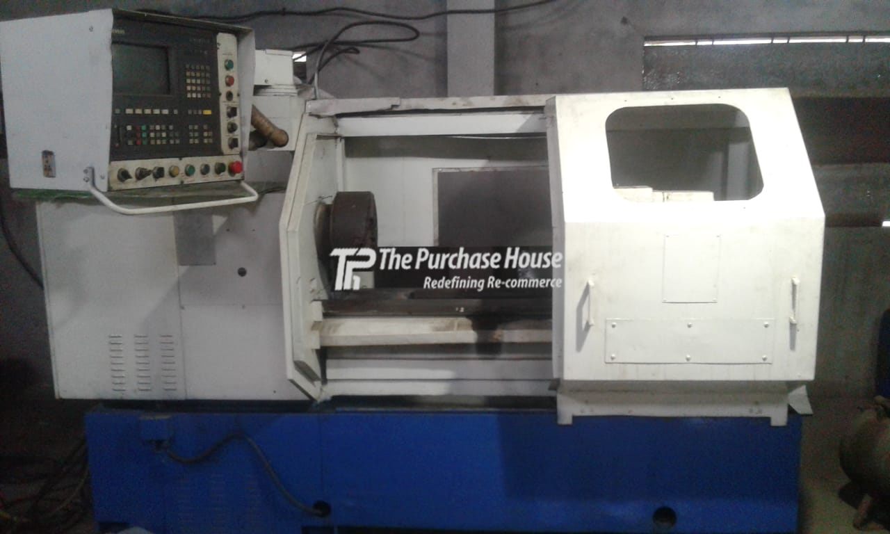 CNC TURNING MACHINE