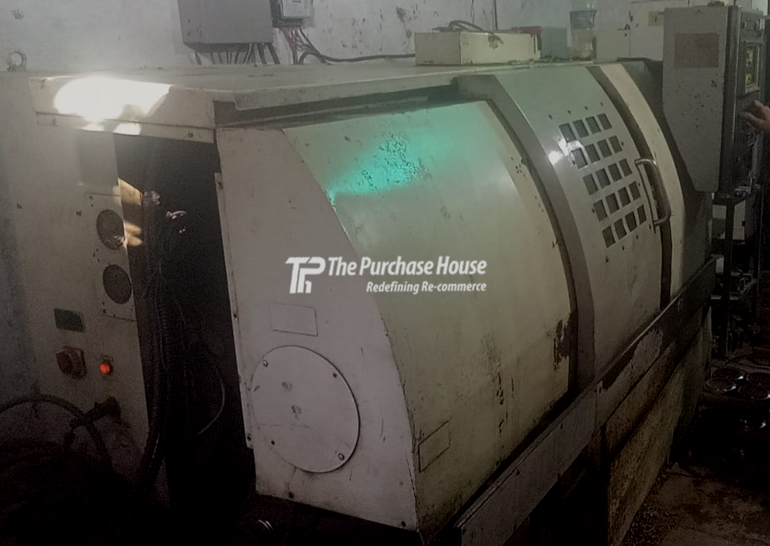 CNC TURNING MACHINE
