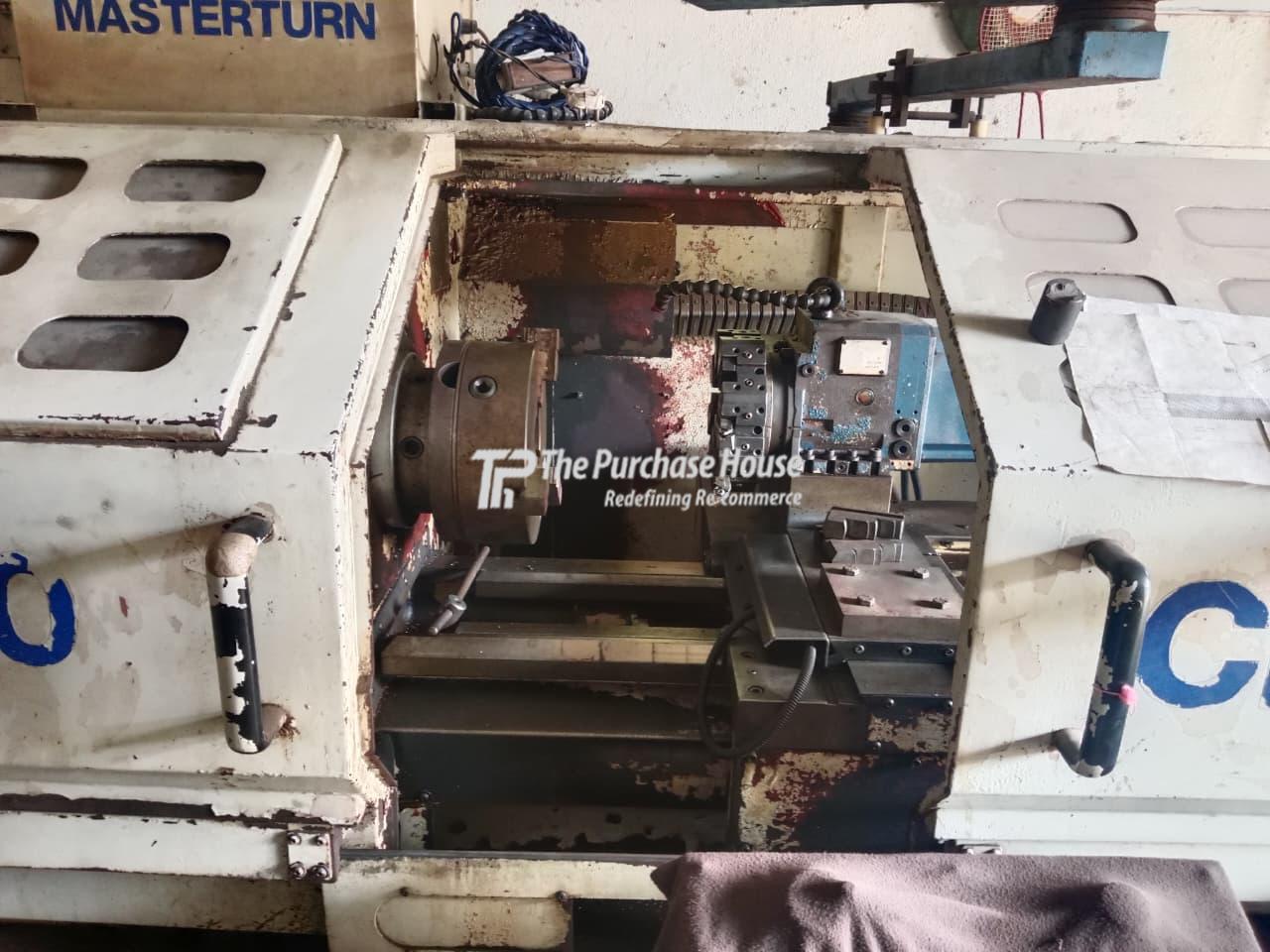 CNC TURNING MACHINE
