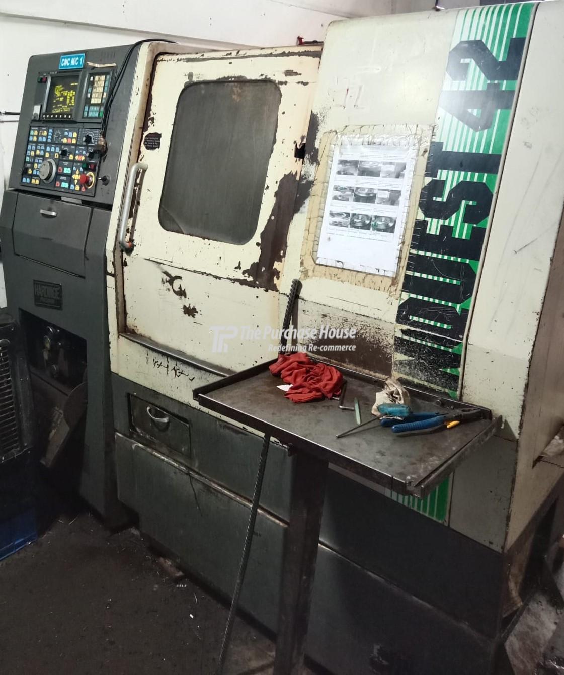 CNC TURNING MACHINE