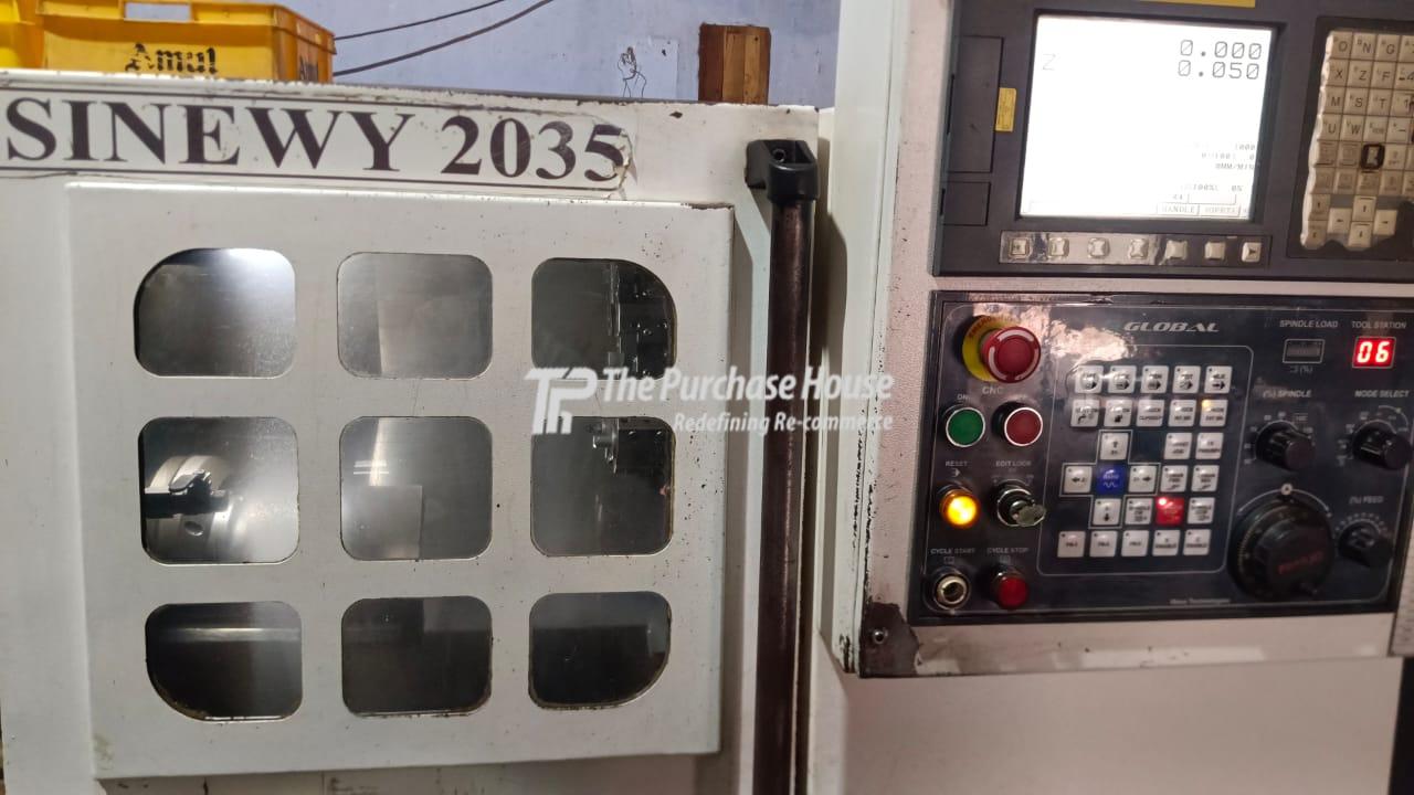 CNC TURNING MACHINE