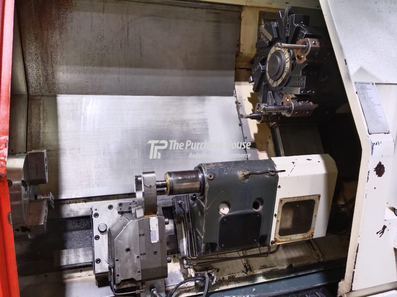 CNC TURNING MACHINE