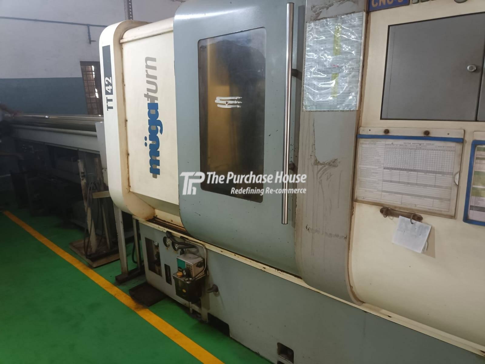 CNC TURNING MACHINE