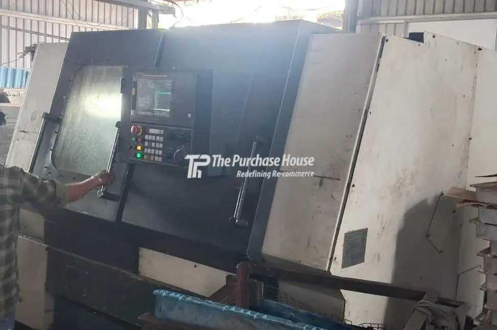 CNC TURNING MACHINE