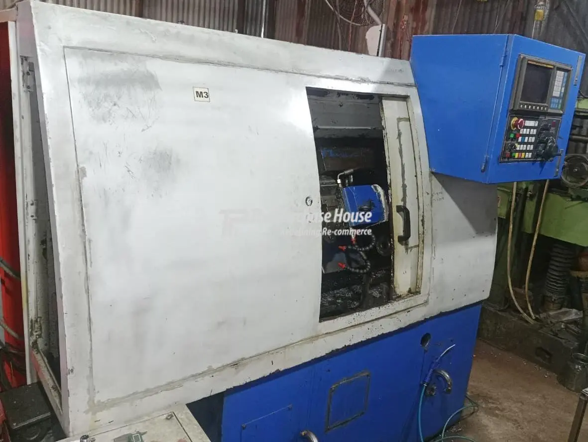 CNC TURNING MACHINE