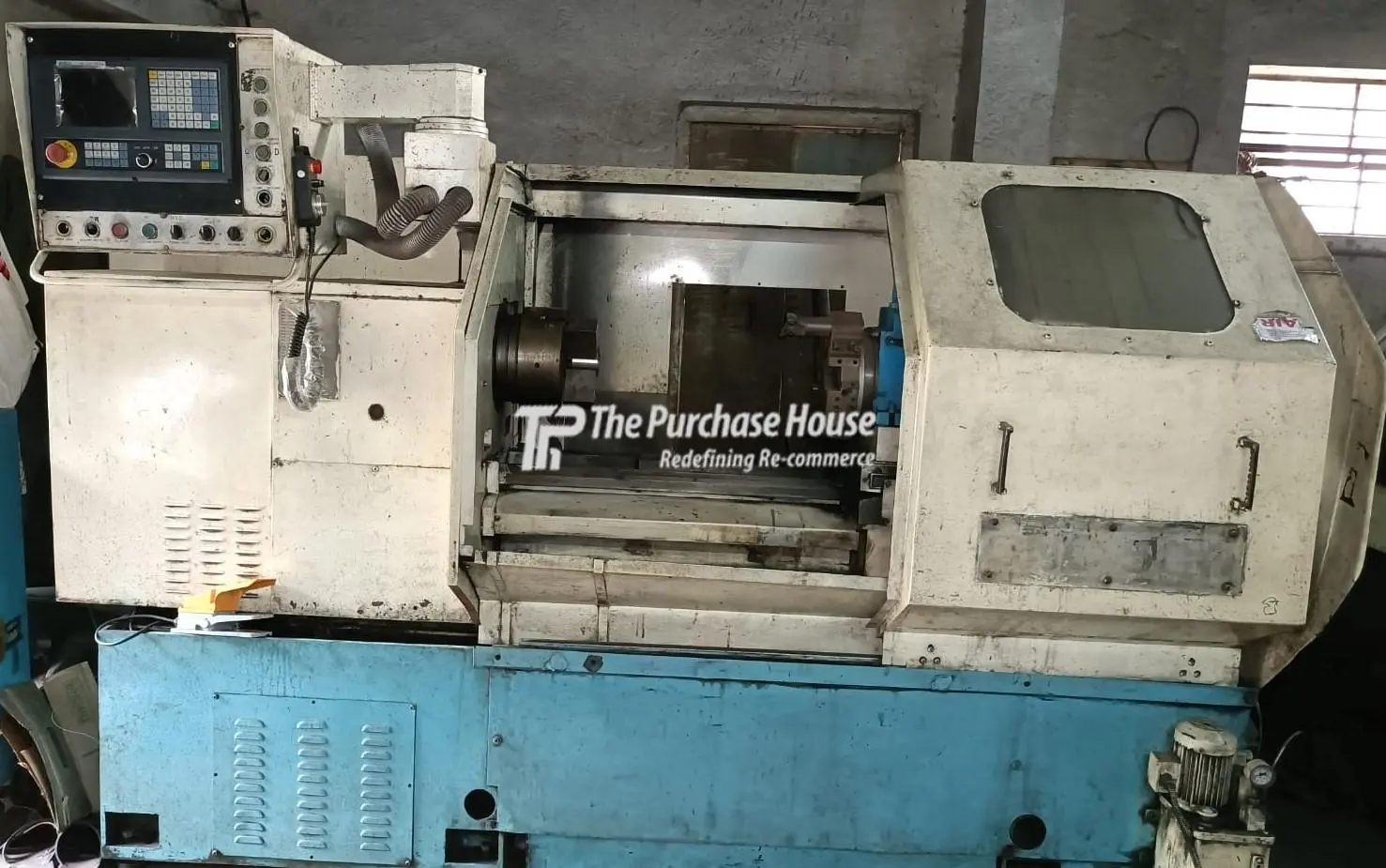 CNC TURNING MACHINE
