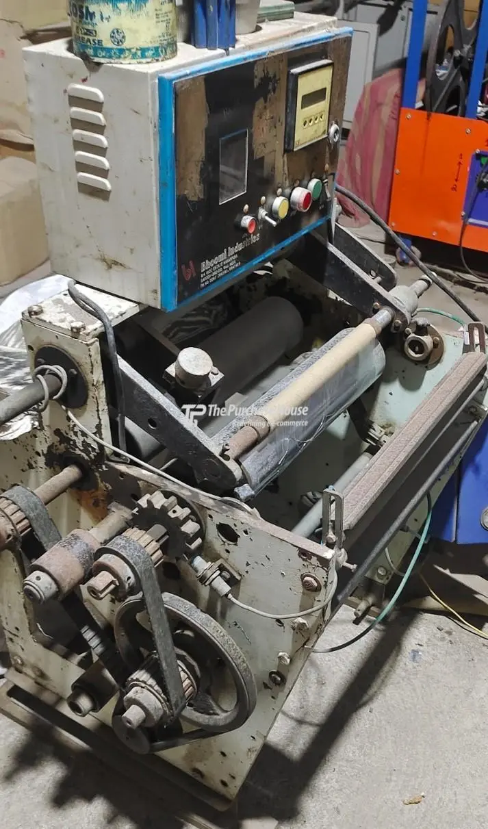 FILM REWINDING MACHINE