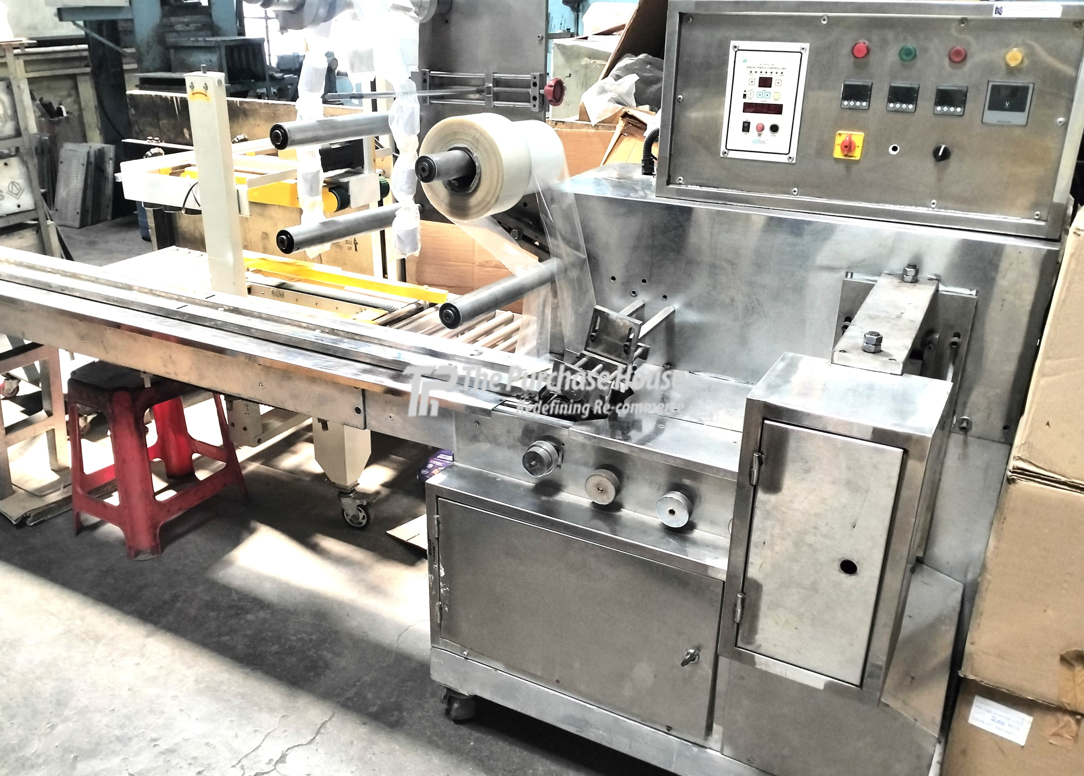 FLOW WRAP MACHINE