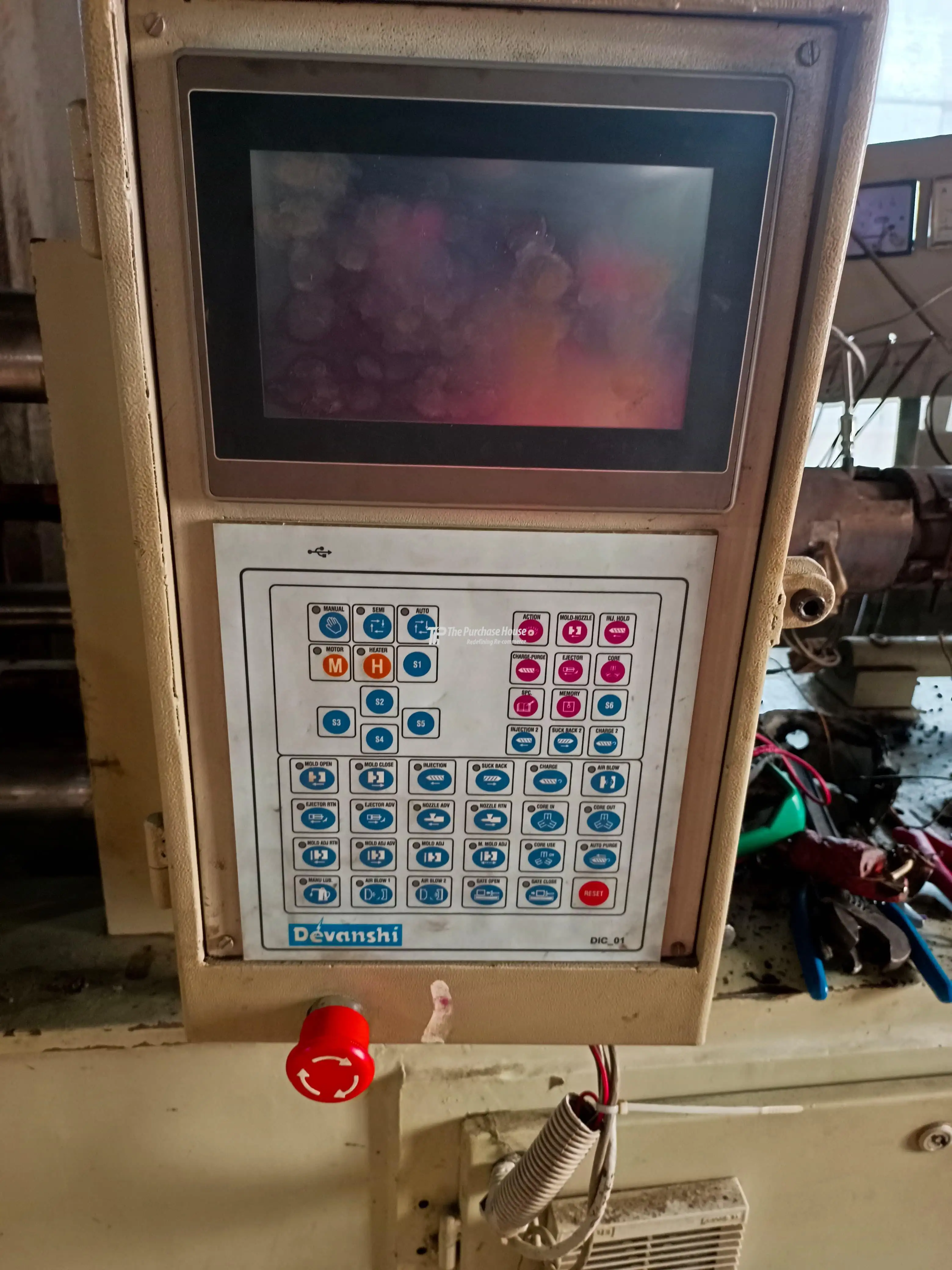 Industrial injection moulding machine setup with control panel