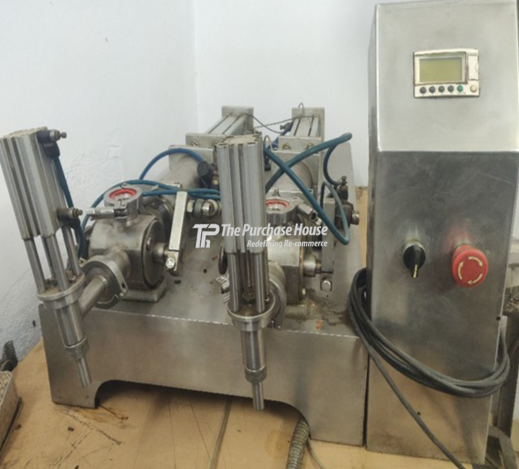 PNEUMATIC LIQUID FILLING MACHINE