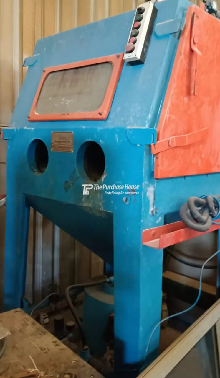 Glass bead blasting machine setup for metal surface finishing