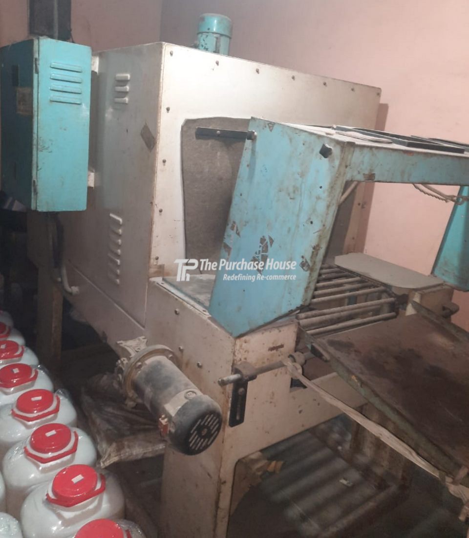 SHRINKING WRAPPING MACHINE