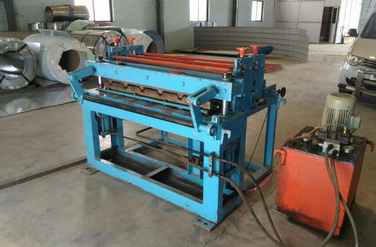 CRAMPING AND PUNCHING MACHINE