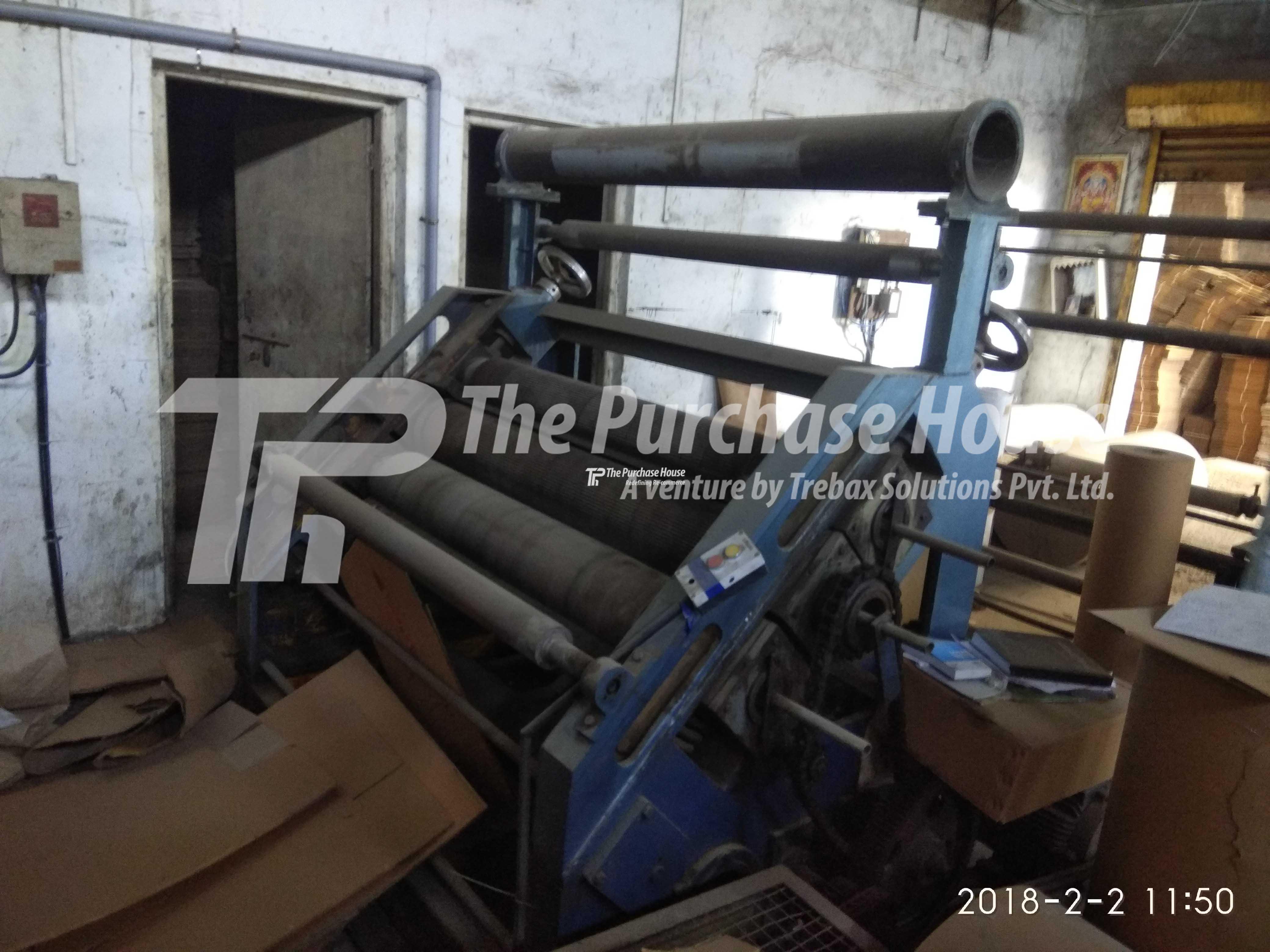 CORRUGATED BOX MANUFACTURING MACHINE