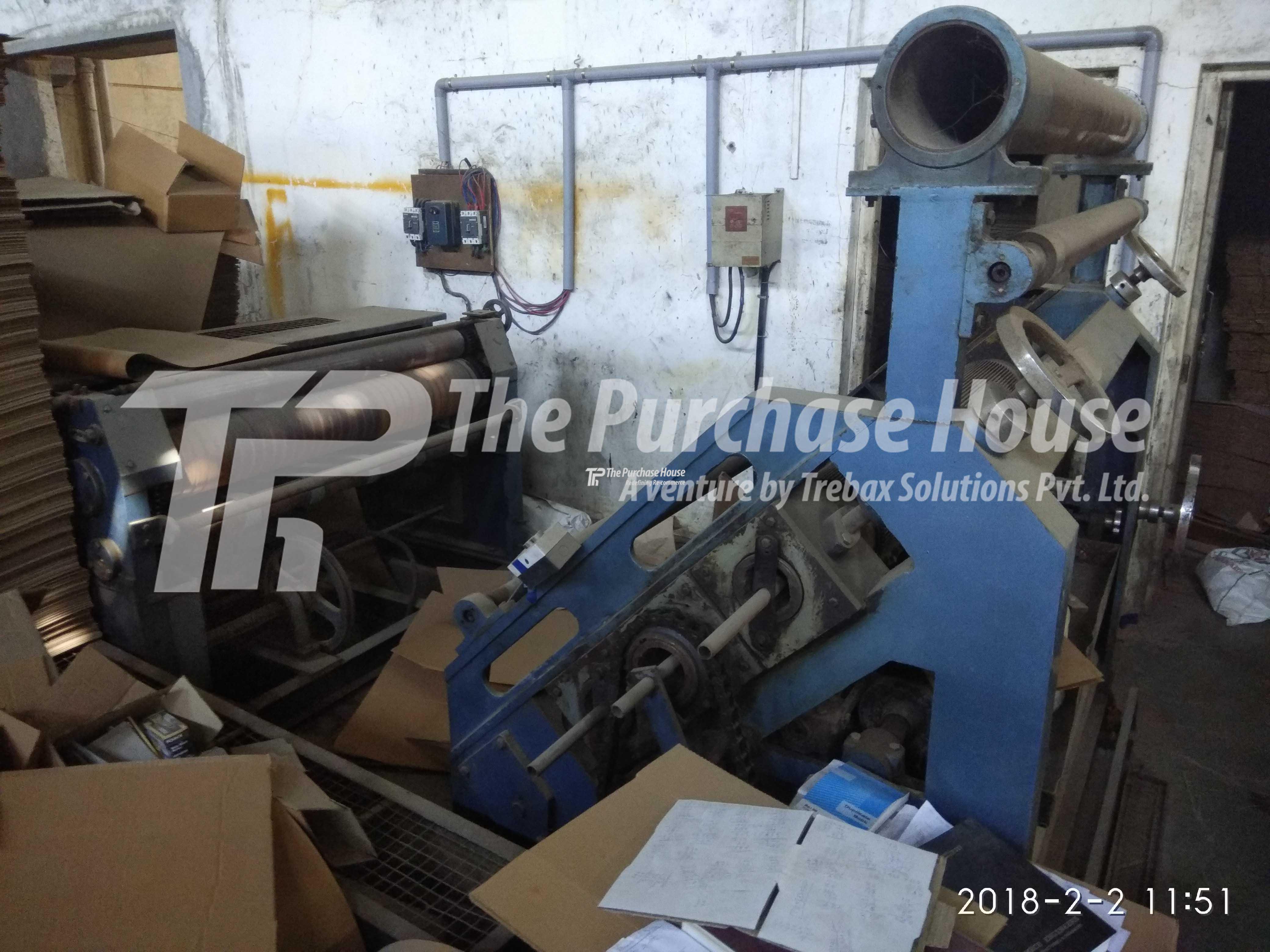 CORRUGATED BOX MANUFACTURING MACHINE