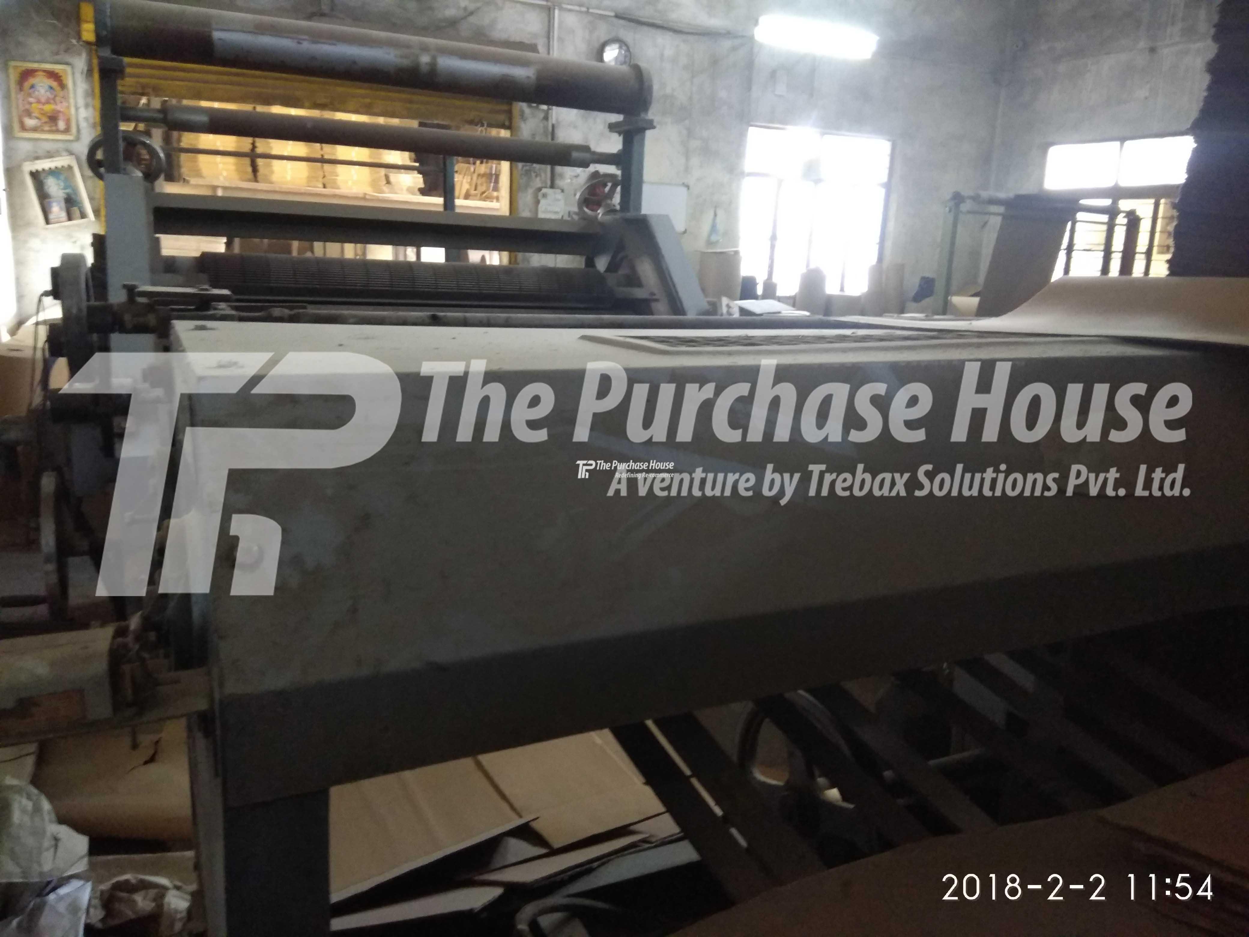 CORRUGATED BOX MANUFACTURING MACHINE