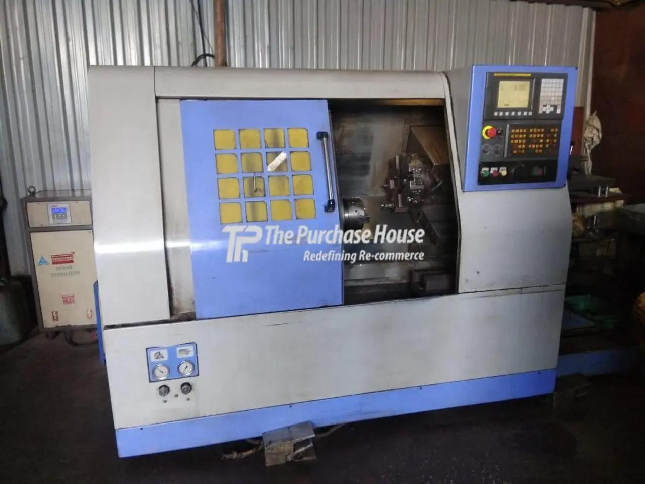 CNC TURNING MACHINE