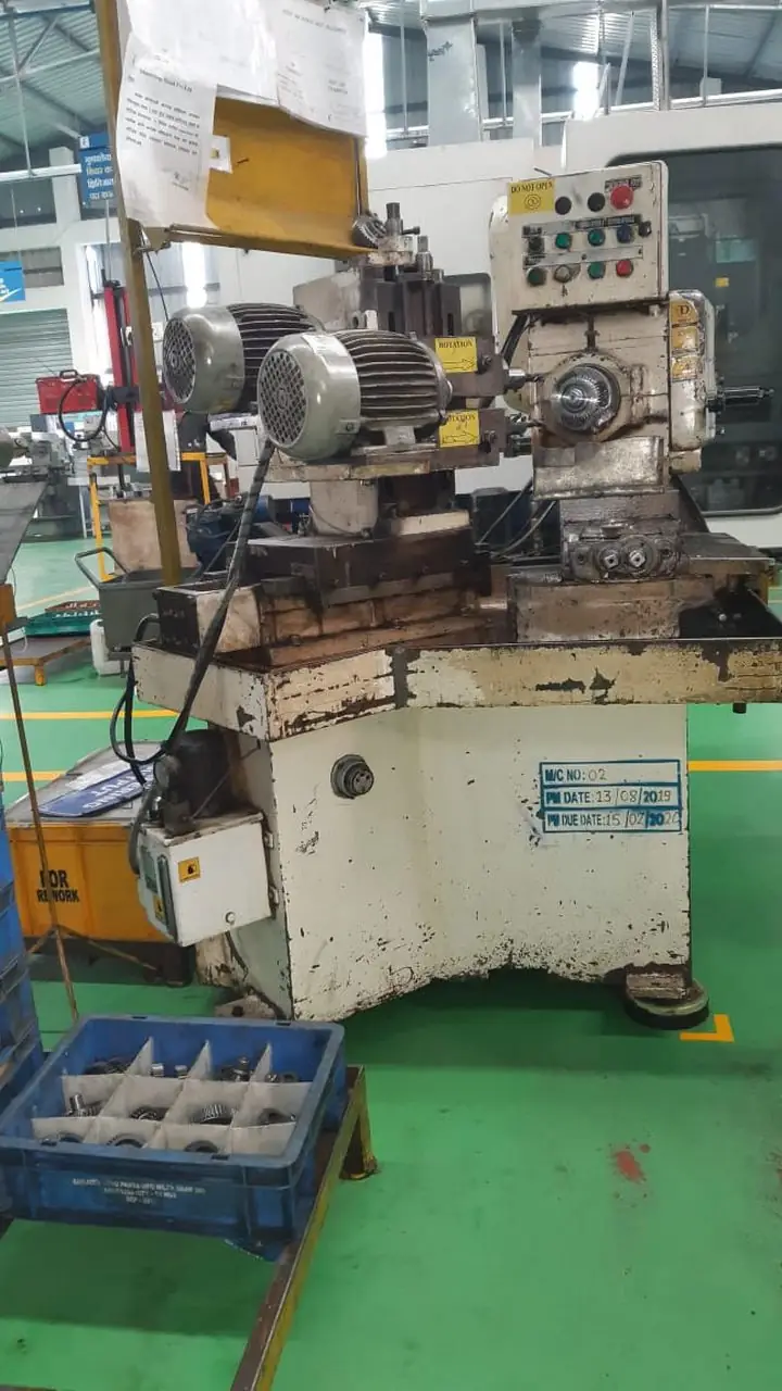 GEAR TOOTH ROUNDING CHAMFERING MACHINE