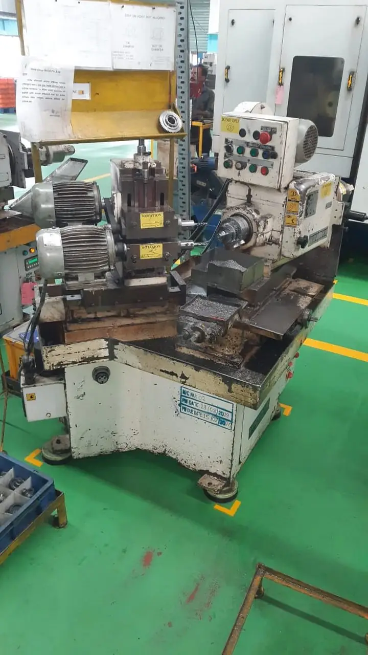 GEAR TOOTH ROUNDING CHAMFERING MACHINE