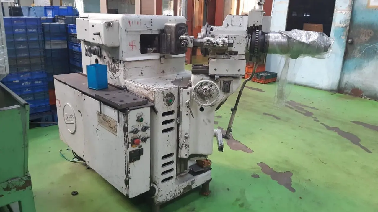 GEAR TOOTH ROUNDING CHAMFERING MACHINE
