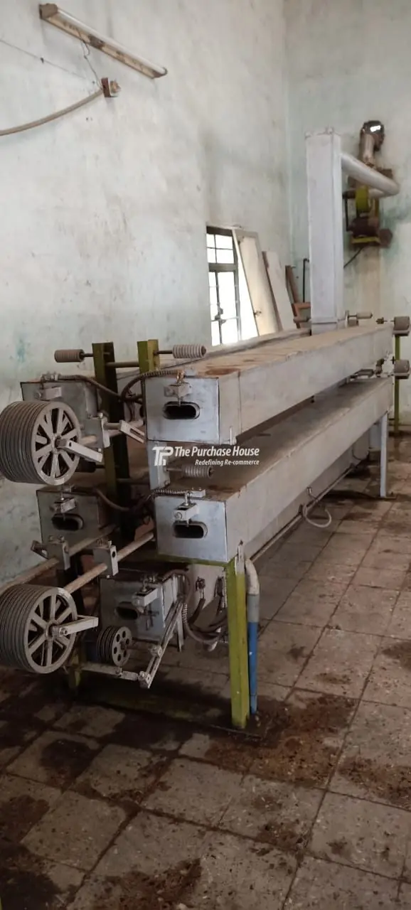 Enamelled wire manufacturing plant with continuous coating