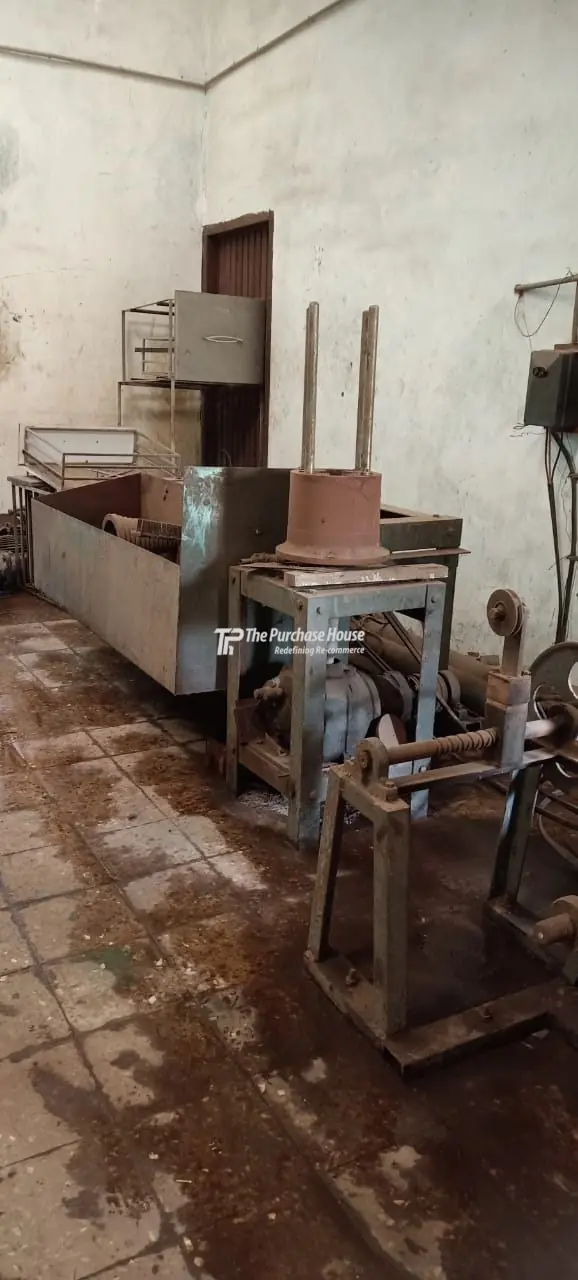 Enamelled wire manufacturing plant with continuous coating