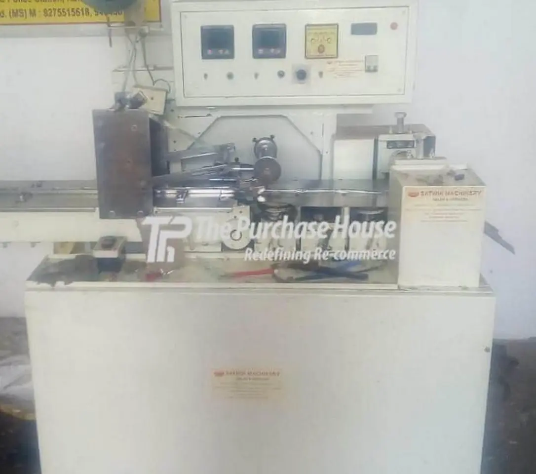 CHOCOLATE PACKAGING MACHINES OR CHIKKI PACKING MACHINES