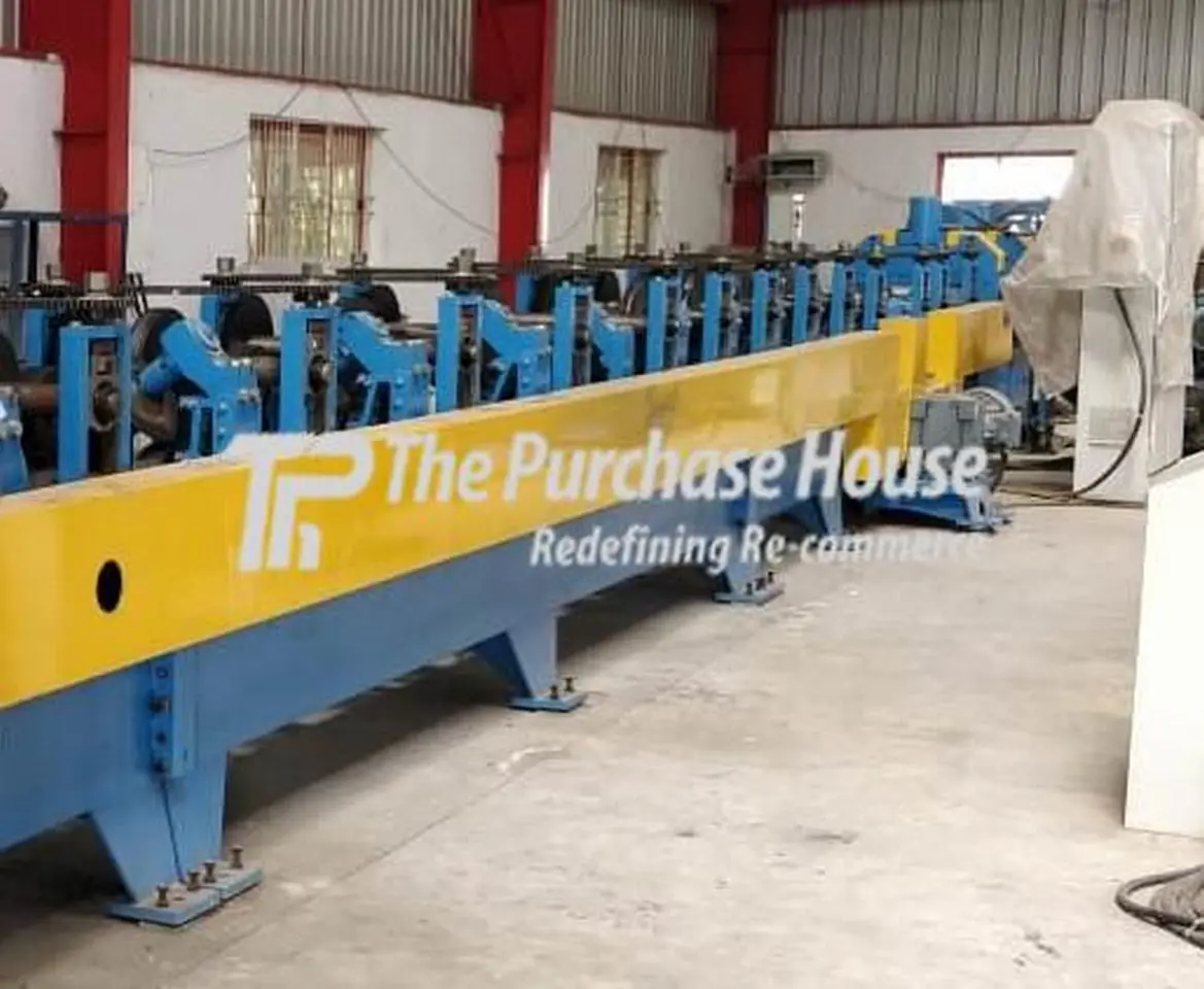 Roll forming machine for roofing sheet manufacturing