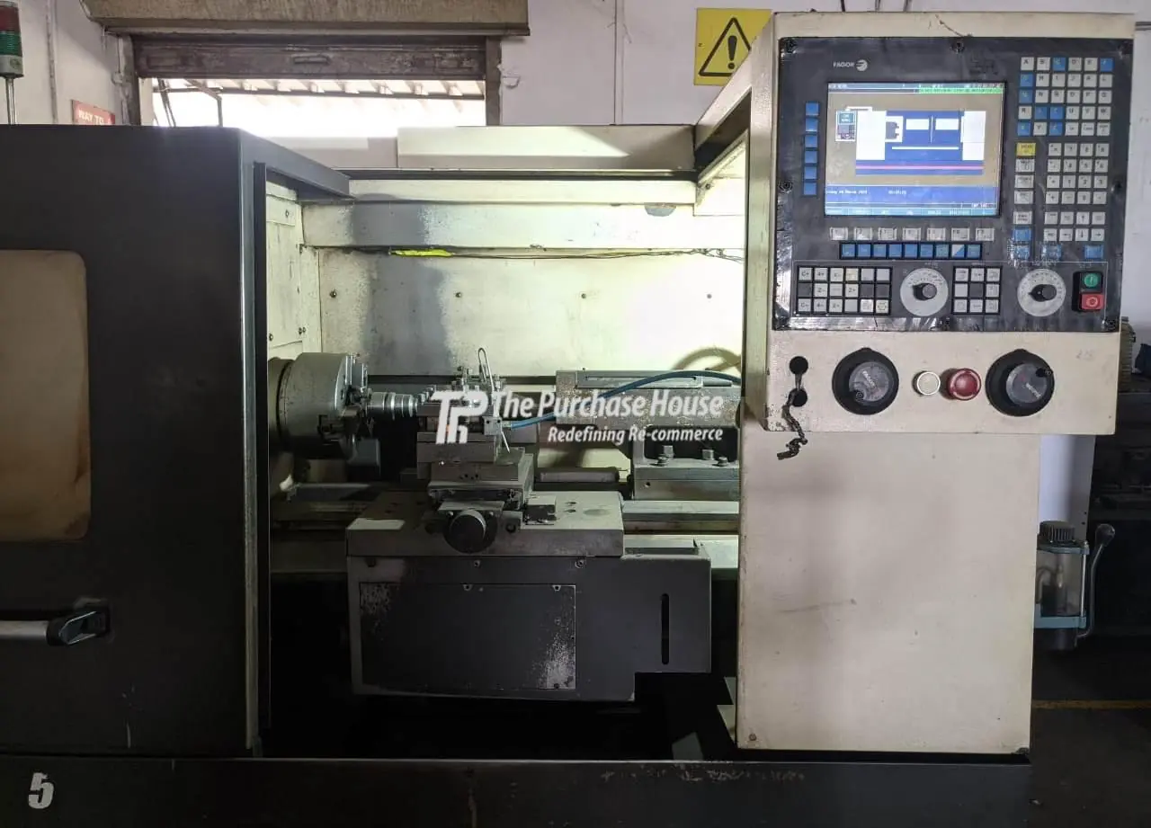 CNC TURNING MACHINE