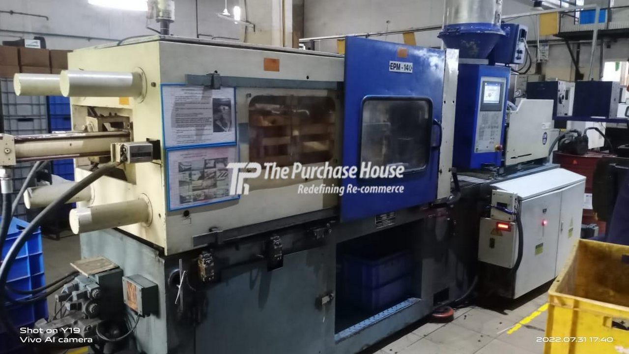PLASTIC INJECTION MOULDING MACHINE