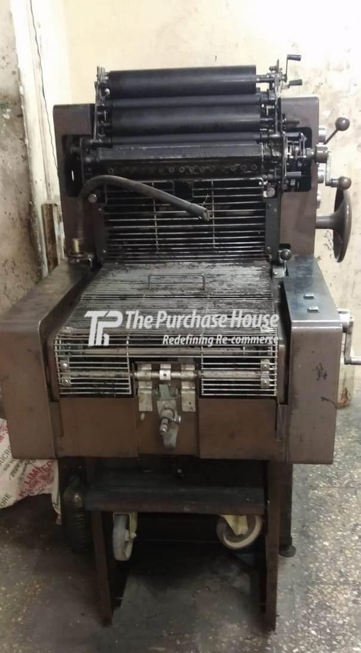 CHAIN DELIVERY PRINTING MACHINE