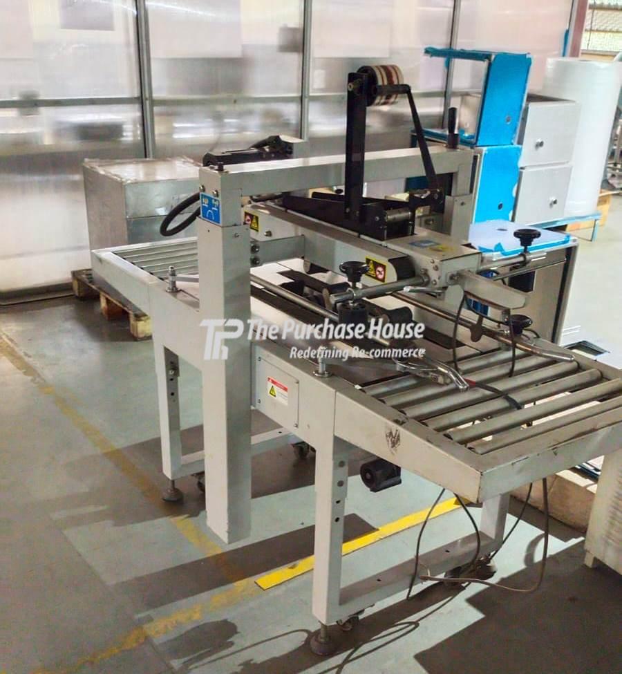 TAPE PACKAGING MACHINE