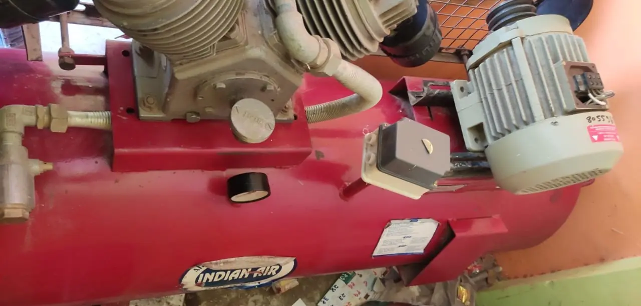 RECIPROCATING AIR COMPRESSOR