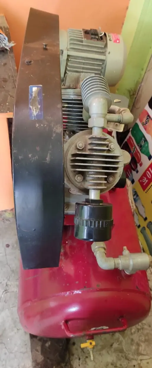 RECIPROCATING AIR COMPRESSOR