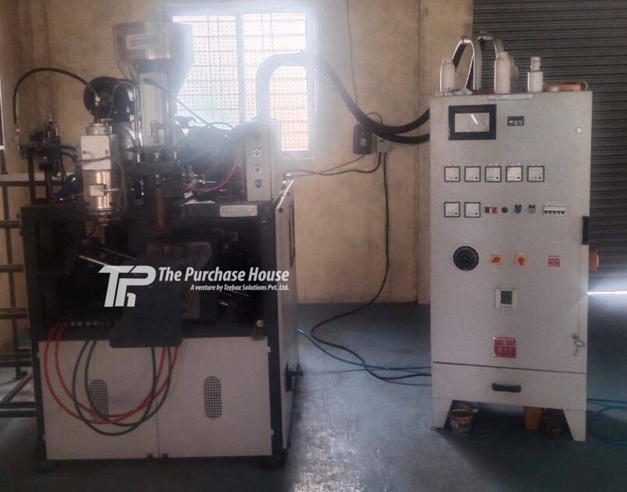 BLOW MOULDING MACHINE