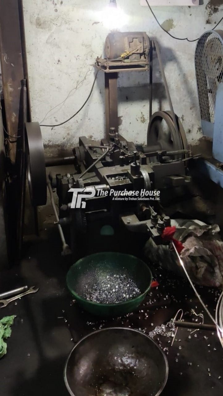 RIVET HEADING MACHINE