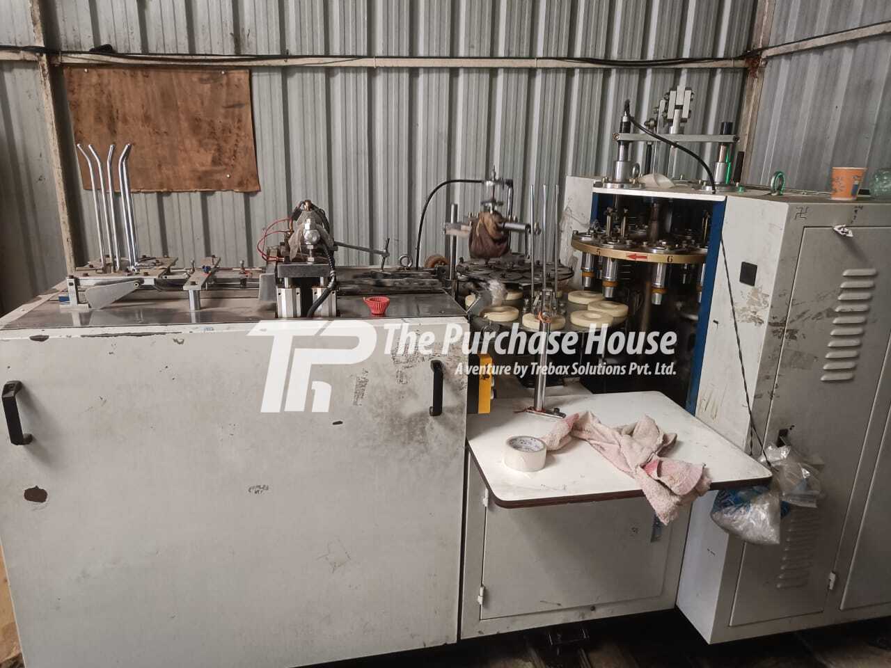 PAPER GLASS MAKING MACHINE