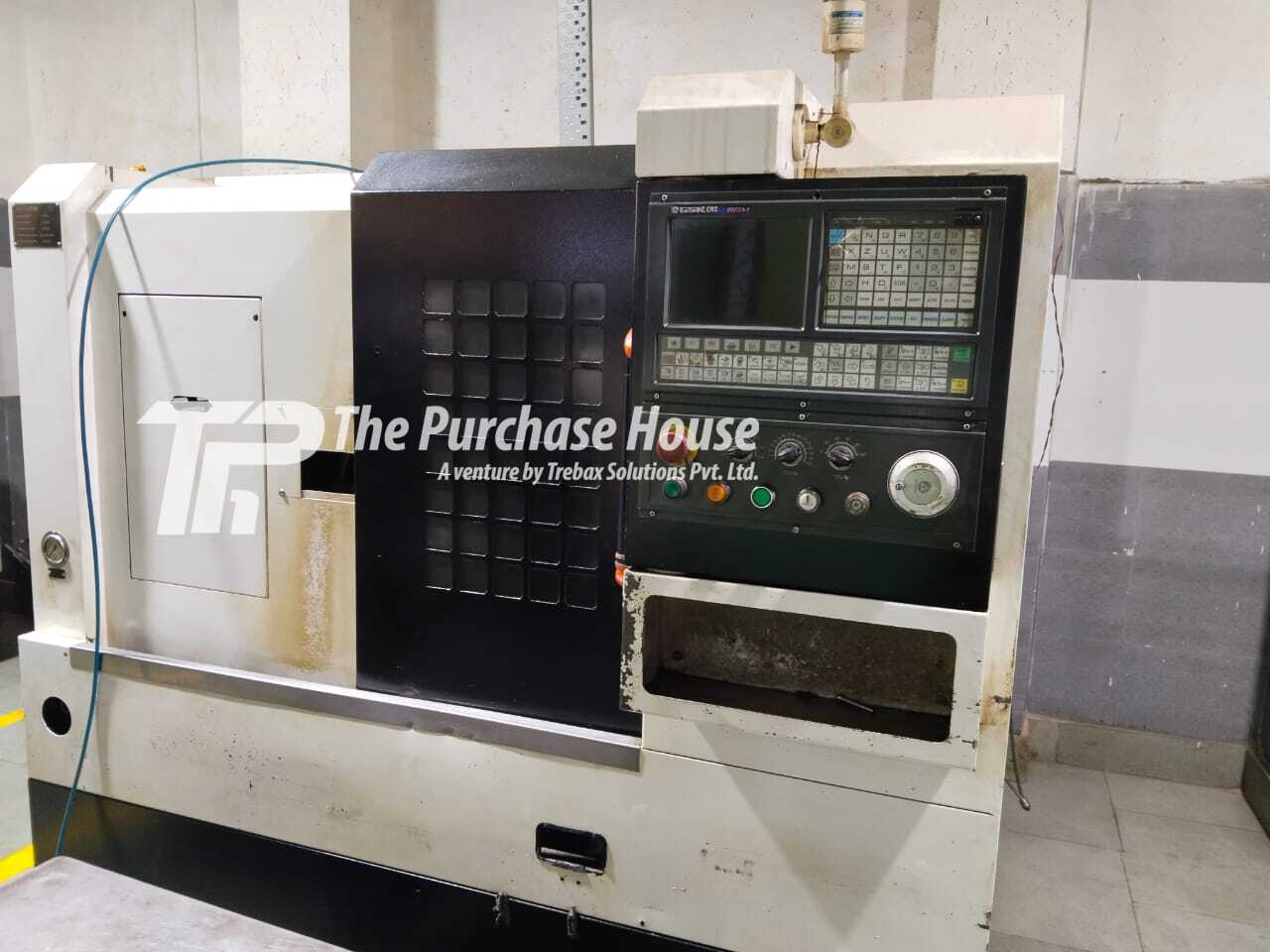 CNC TURNING MACHINE