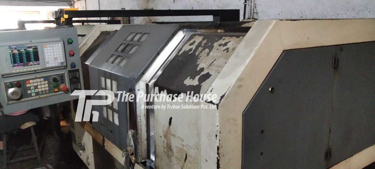CNC TURNING MACHINE