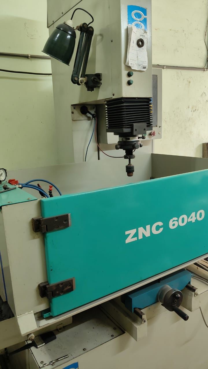 CNC ELECTRICAL DISCHARGE MACHINE (CNC EDM MACHINE)