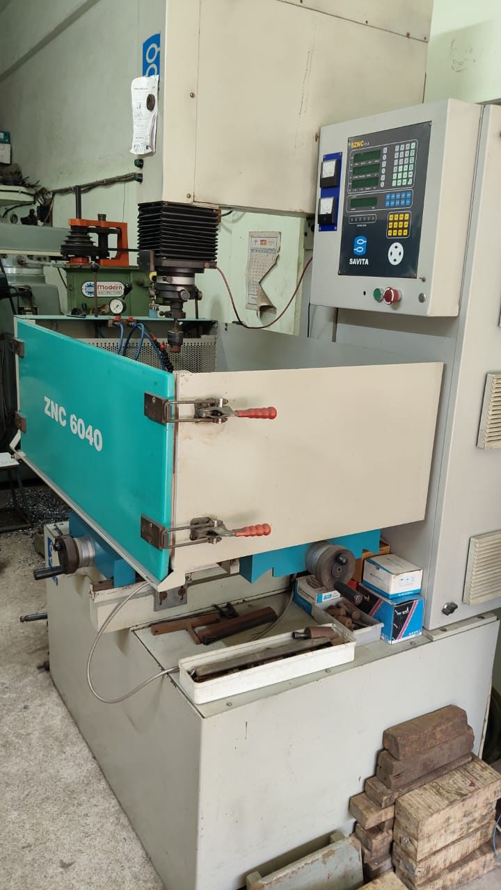CNC ELECTRICAL DISCHARGE MACHINE (CNC EDM MACHINE)